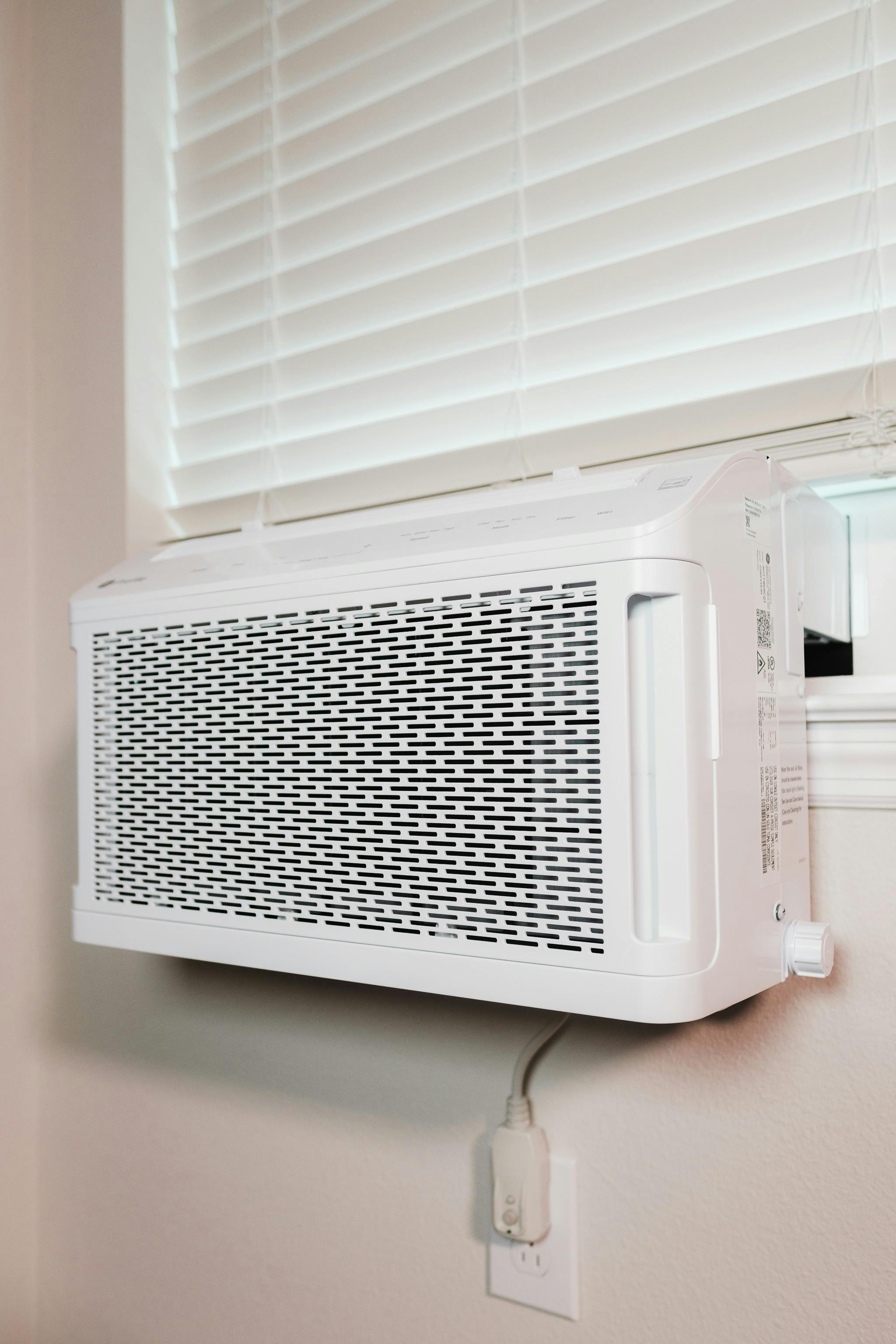 Modern window air conditioning unit installation